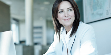 doctor in office with laptop