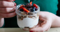 woman eating yoghurt